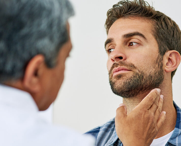 Doctor, hand and man for thyroid with patient, healthcare or diagnosis in clinic. Hospital, help or check up for throat and gland pain for male person, specialist or medical result test for